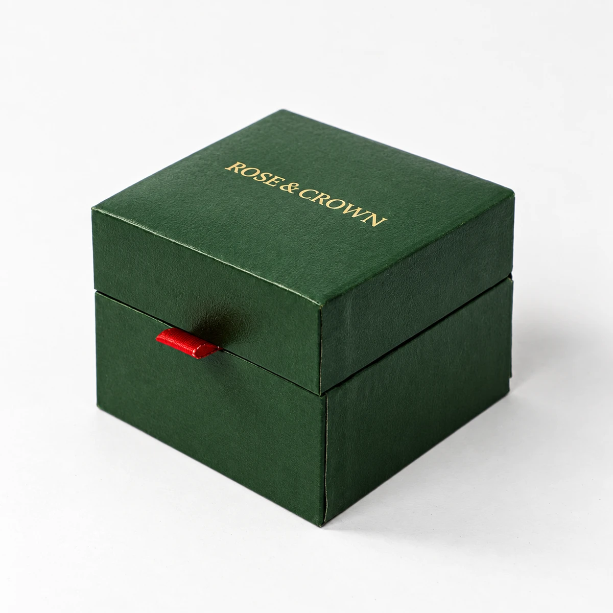 Olive green wrapped rigid box with blind embossed detail